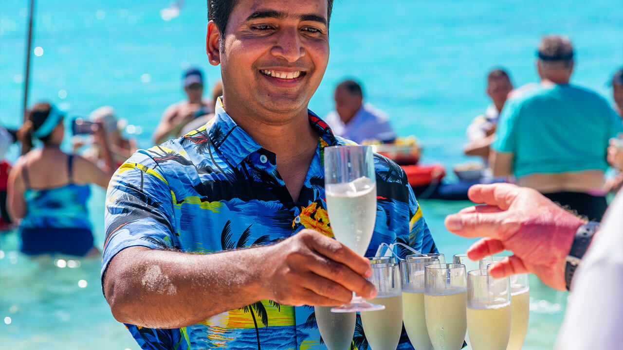 Serving champagne at the Champagne and Caviar Splash™